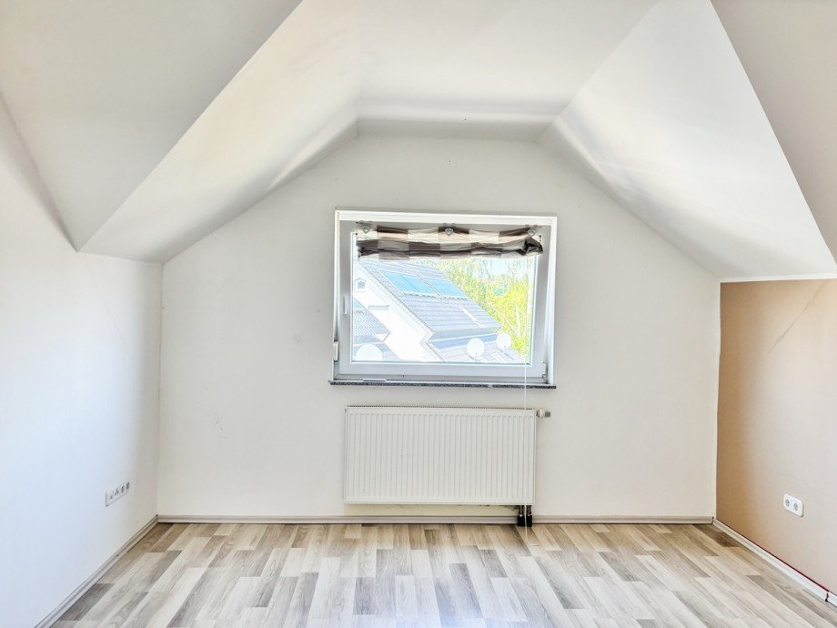 Schlafzimmer ImmoXXL Dachgeschosswohnung Herford